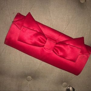 Red satin evening clutch